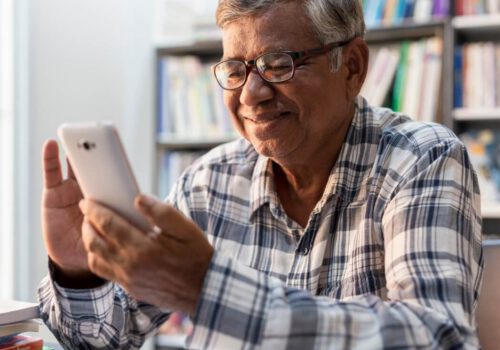 Man looking at his cell phone